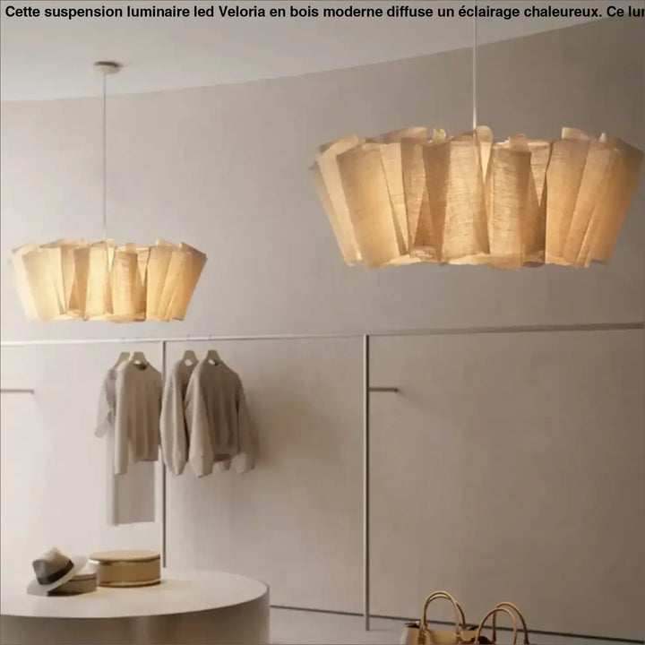 Deux suspensions luminaire led beige en papier plissé avec abat-jour en bois moderne veloria suspendues au plafond