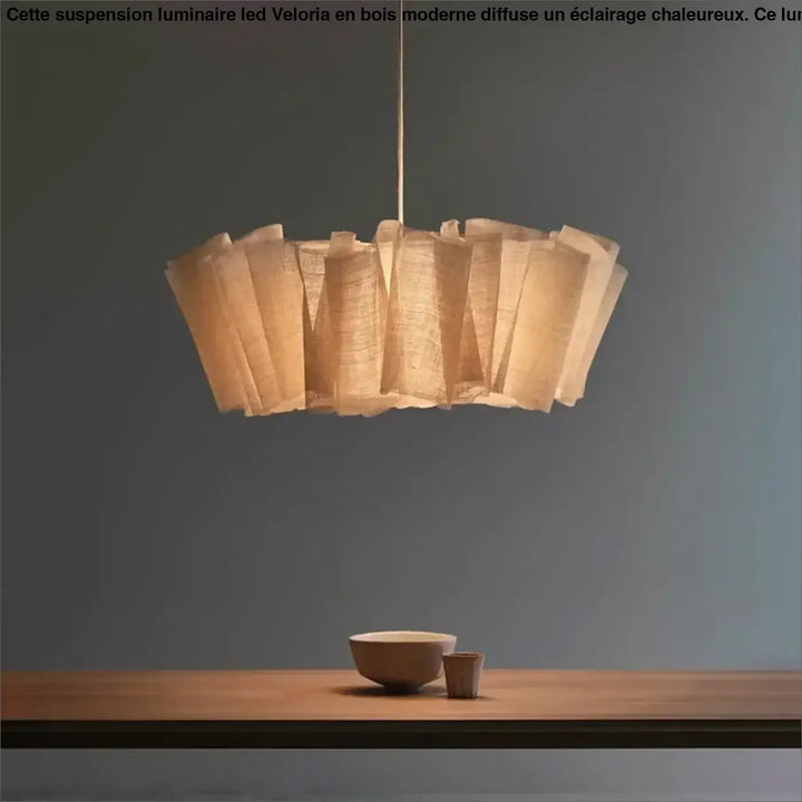 Suspension luminaire led warm ton avec abat jour en papier fait main et design organique chez veloria