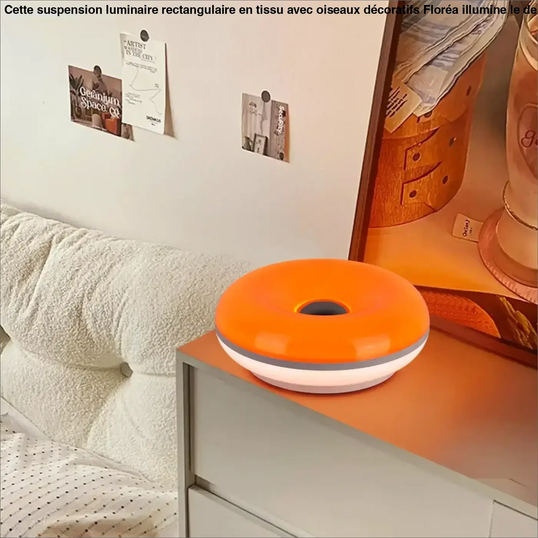 Lampe de table haus ia led orange en forme de donut avec base blanche et anneau gris pour une idée cadeau originale et une touche unique