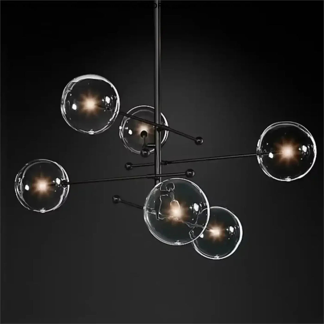 Plafonnier moderne atomix noir avec globes en verre clair idéal pour salle à manger acier et laiton doré