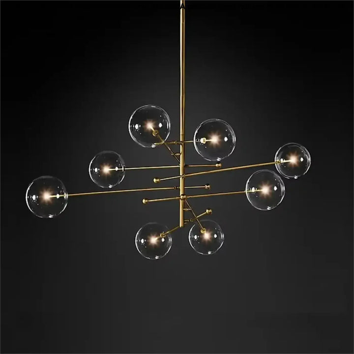 Plafonnier moderne laiton doré atomix avec ampoules sphériques en verre clair pour salle à manger élégante
