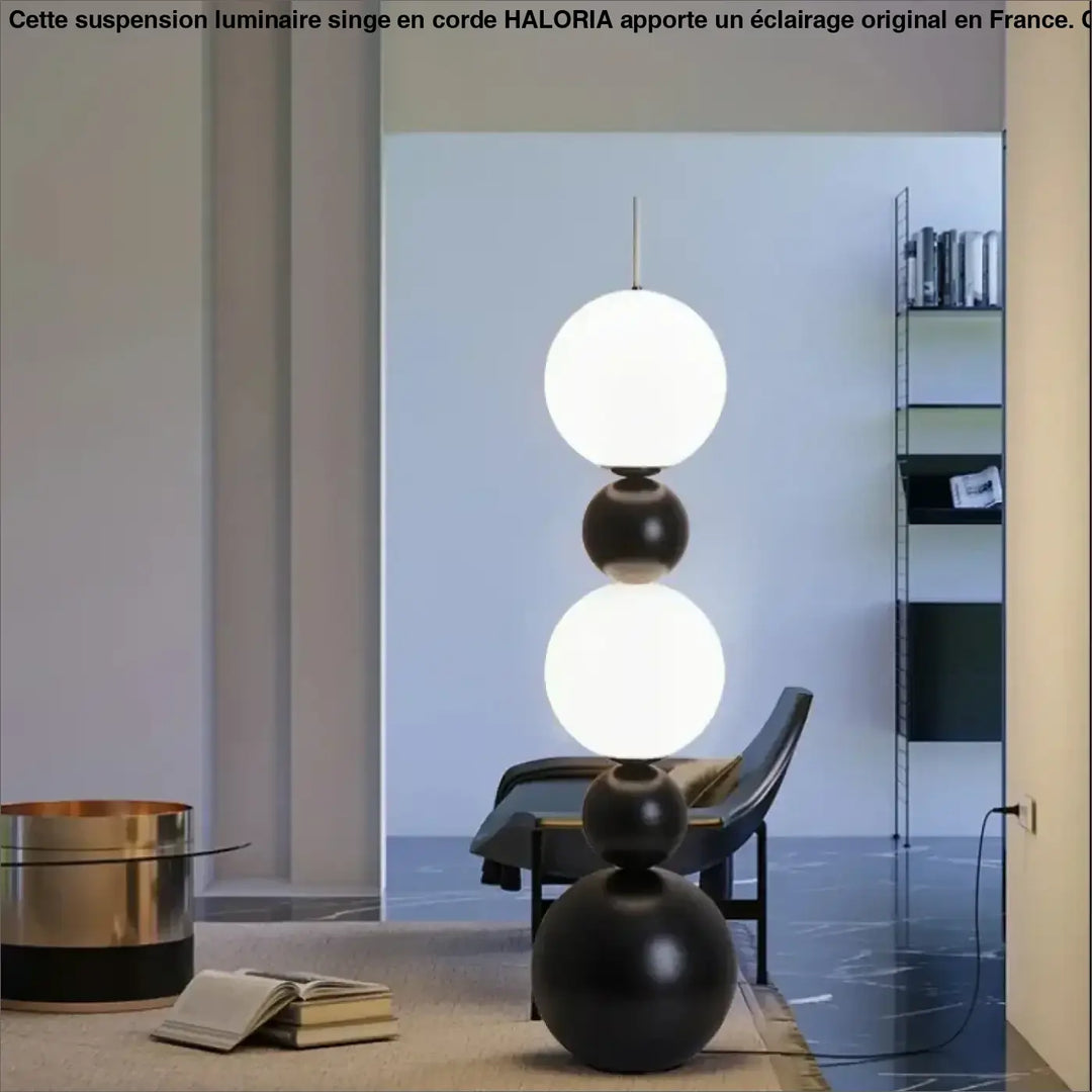 Lampadaire maitora minimaliste chic avec boules lumineuses empilées en noir brillant et blanc mat pour décoration intérieure