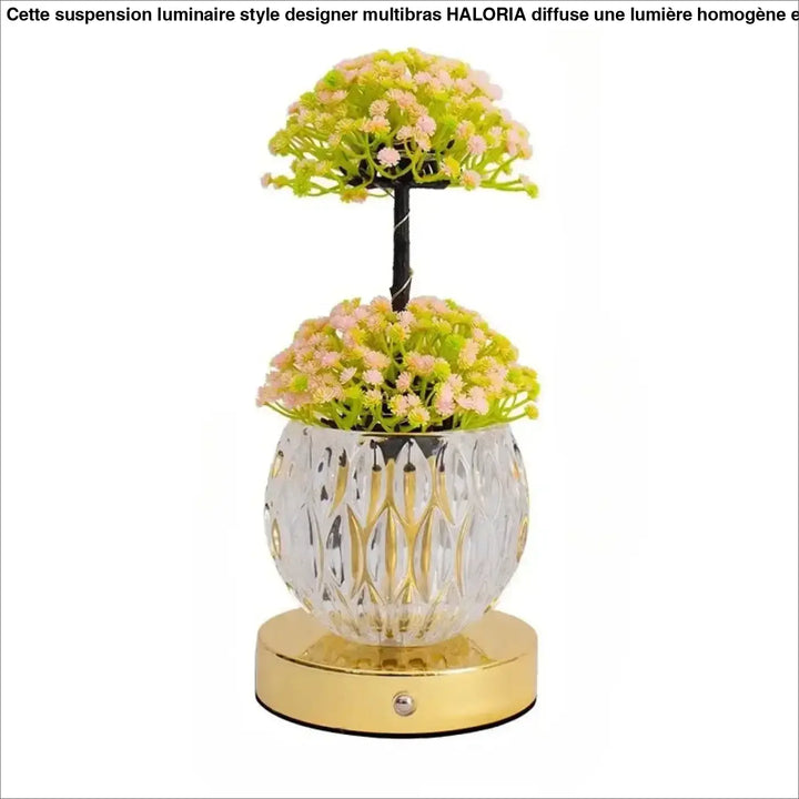 Lampe de table tulyna avec corps en verre facetté clair, garniture dorée, fleurs artificielles roses et vertes, source de lumière