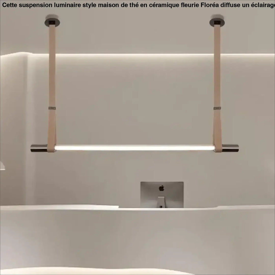 Suspension luminaire lea minimaliste led avec finitions métalliques et sangles en cuir beige pour salle de bain moderne