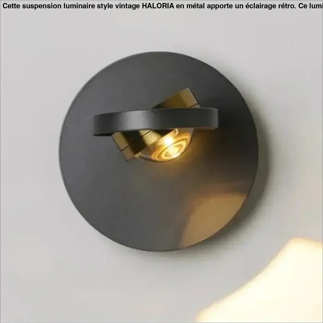 Applique murale fokus moderne noire et or avec base circulaire et fixation éclairage ajustable pour mur intérieur