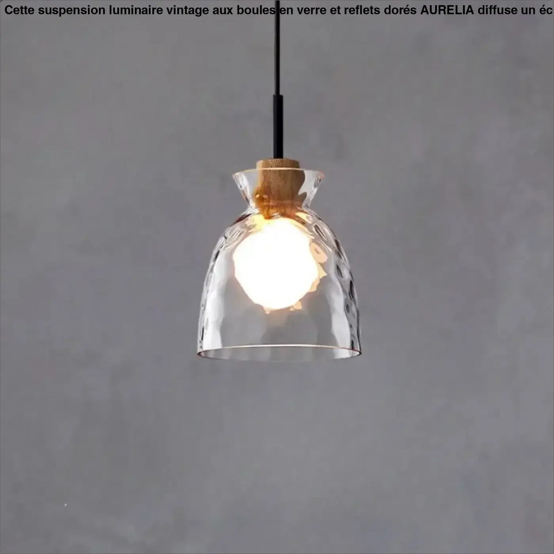 Suspension luminaire tukai en verre clair texturé martelé avec accent en liège bois au sommet