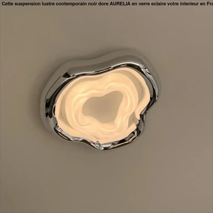 Plafonnier led design moderne chromé forme organique élégante

