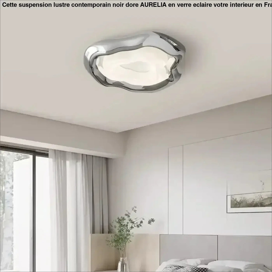 Plafonnier led design moderne chromé forme organique élégante

