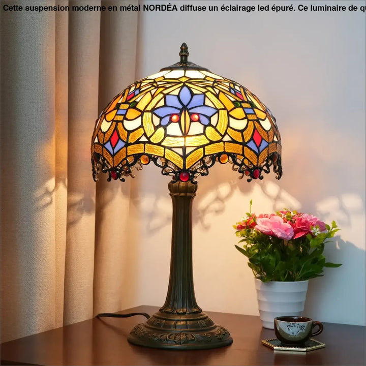 Lampe de table Nanih vintage style tiffany avec abat-jour en verre teinté floral jaune bleu rouge base en métal bronze
