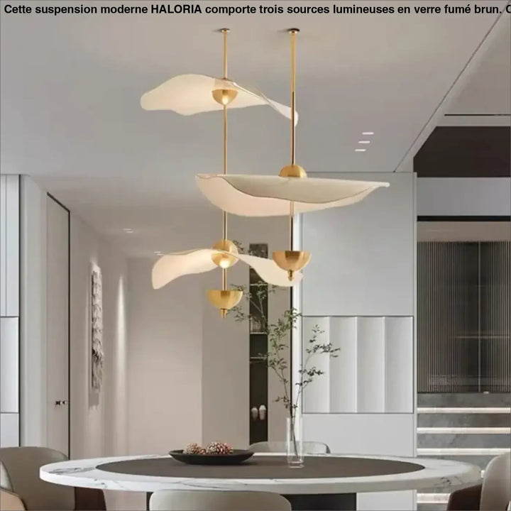 Suspension luminaire moderne dorée design aérien élégant