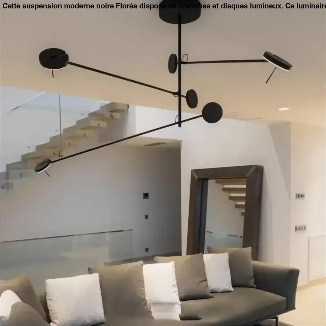 Suspension moderne noire à branches et disques lumineux

