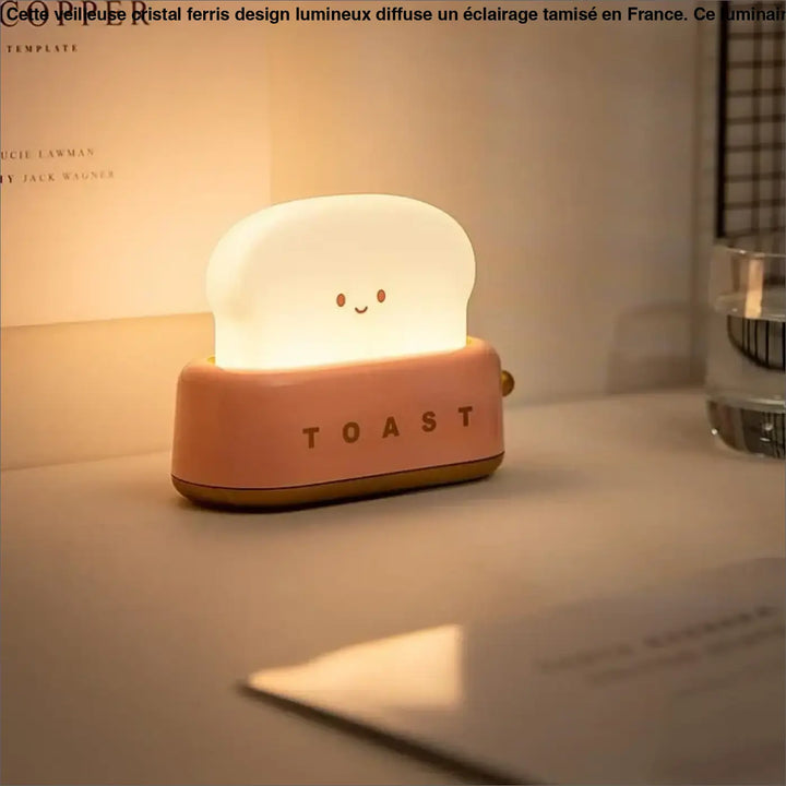 Veilleuse kawaii toast en silicone rose doux en forme de tranche de pain souriante avec lumière douce intégrée
