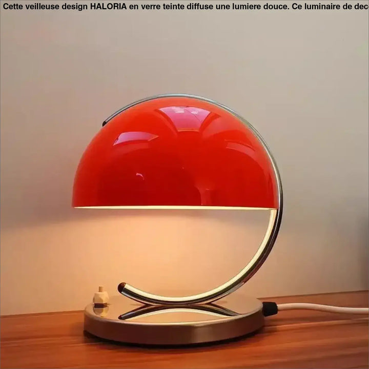 Lampe de table arko rouge avec base métallique chromée et lumière douce pour une table élégante au design minimaliste