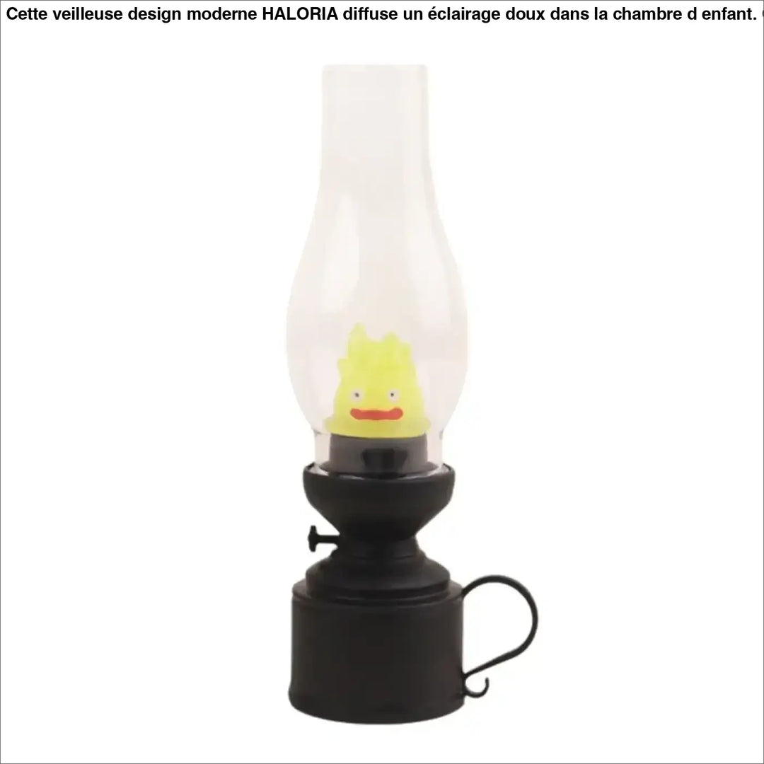Veilleuse hallo en métal noir avec cheminée en verre clair et figurine jaune souriante pour décoration intérieure effet flamme veilleuse led effet