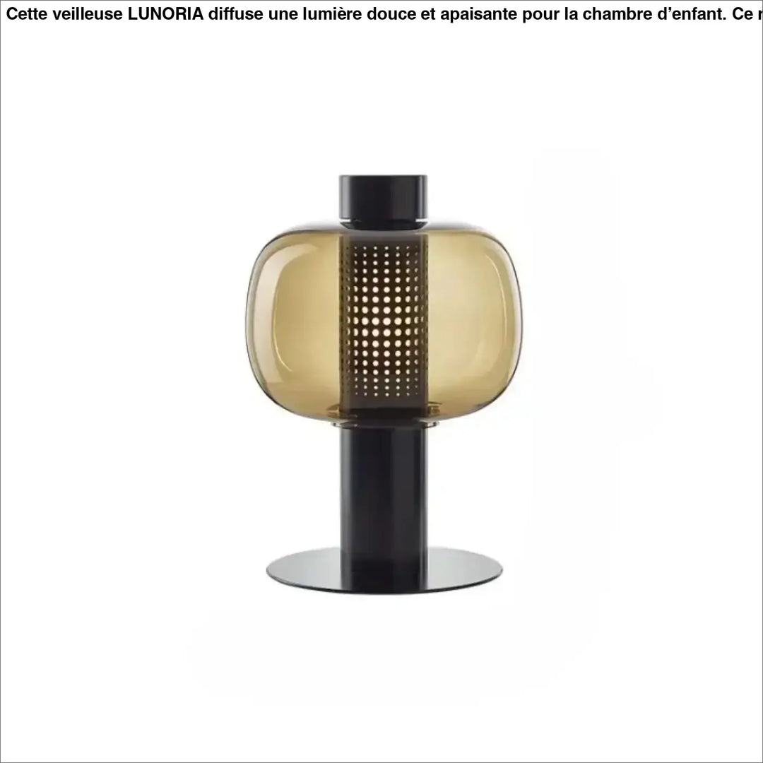 Lampe de table vetra en verre coloré ambré avec base en métal noir et colonne perforée design moderne pour table contemporaine