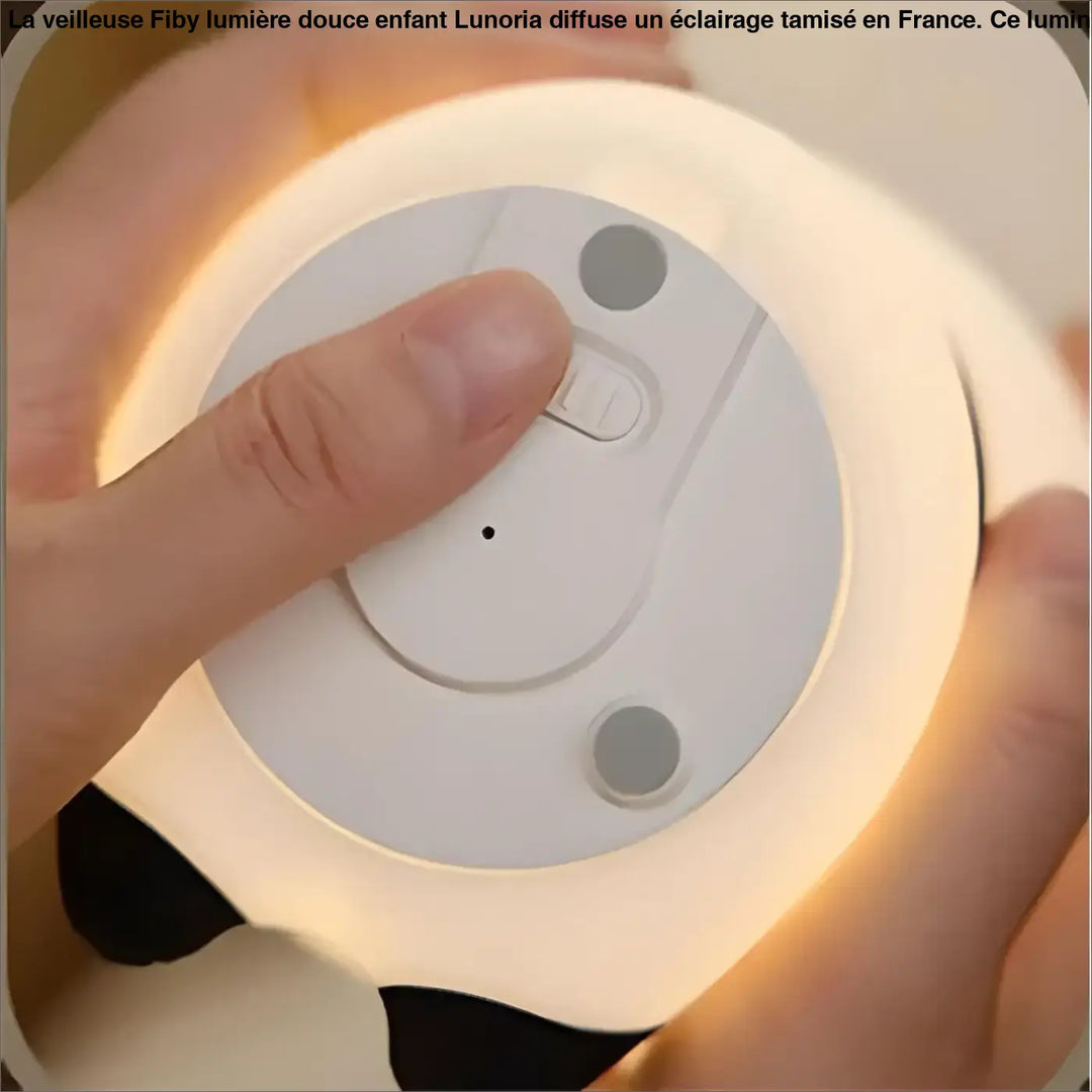 Veilleuse fiby lumiere douce enfant blanc avec un design minimaliste et une lumière led circulaire douce