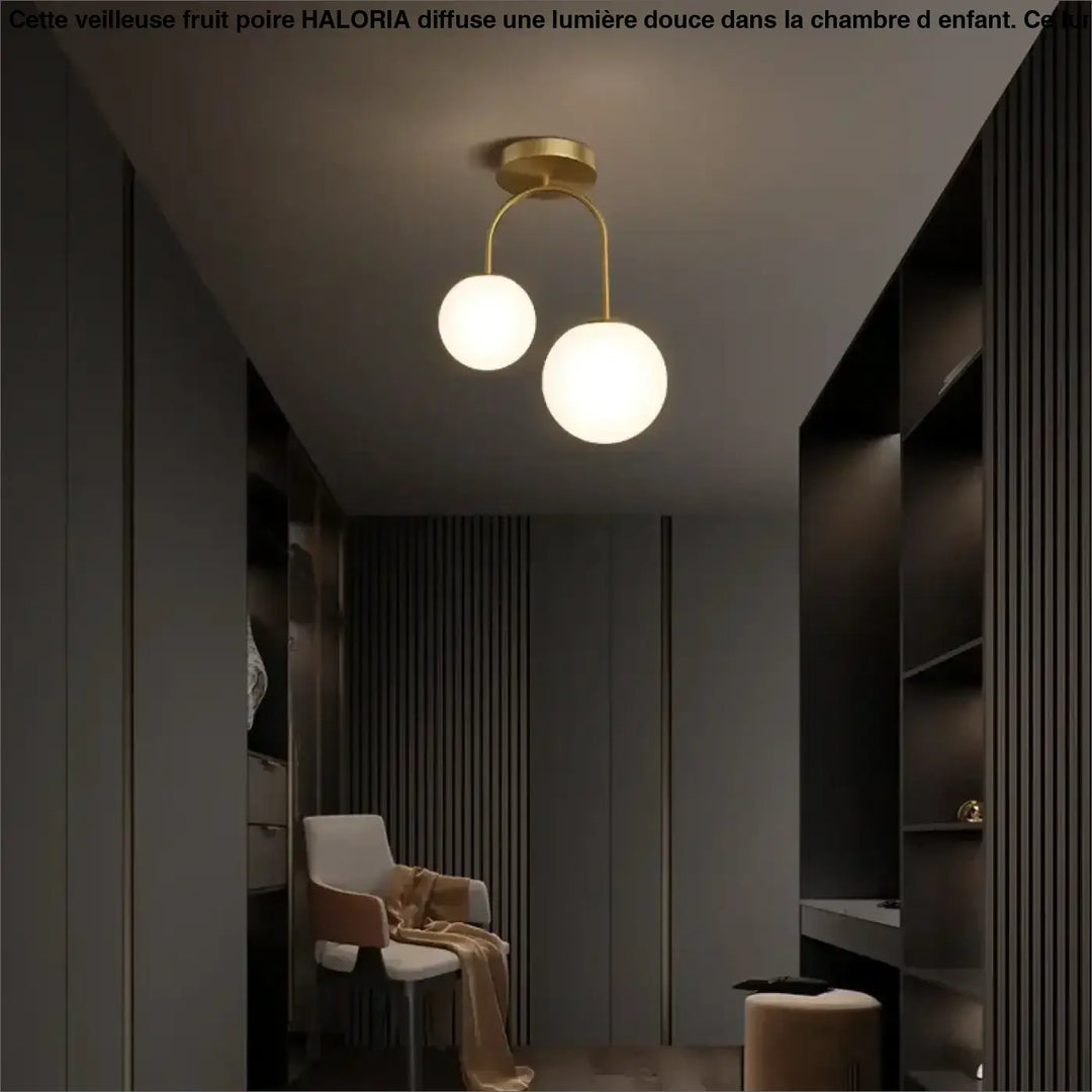 Luminaire plafonnier solia en métal doré avec deux globes en verre dépoli design chic plus classique