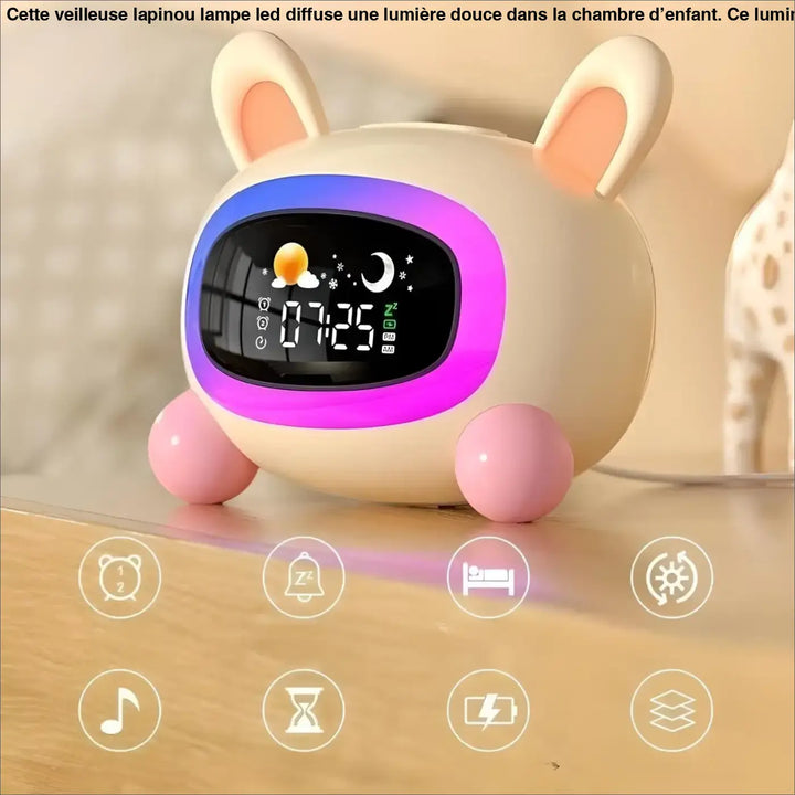 Veilleuse lapinou lampe led chambre d’enfant crème avec oreilles roses et écran lumineux violet affichant heure et météo