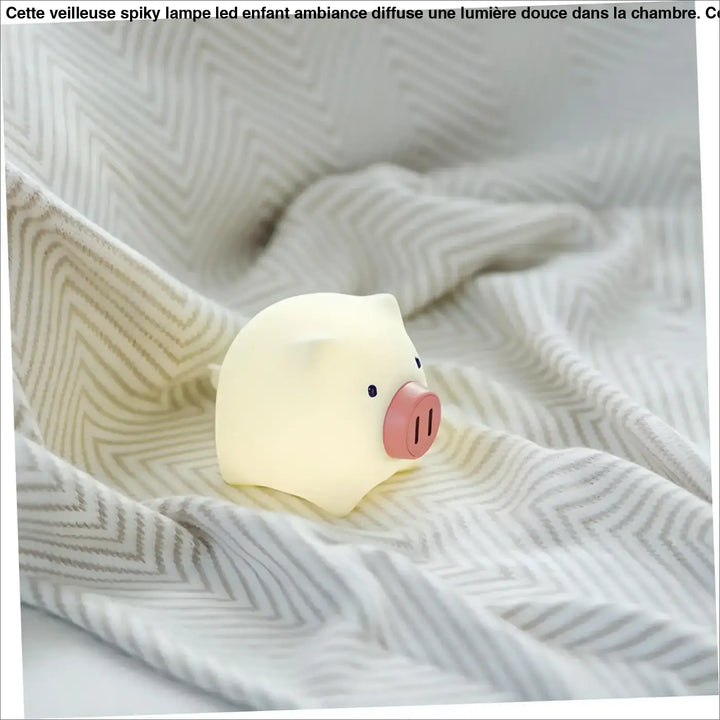 Veilleuse spiky lampe led enfant en silicone crème en forme de cochon avec nez rose et yeux noirs lunoria